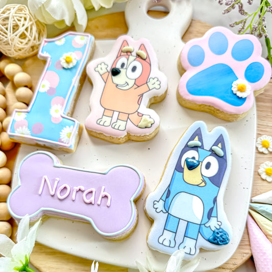 Bluey and Bingo themed sugar cookies, including characters and the number one