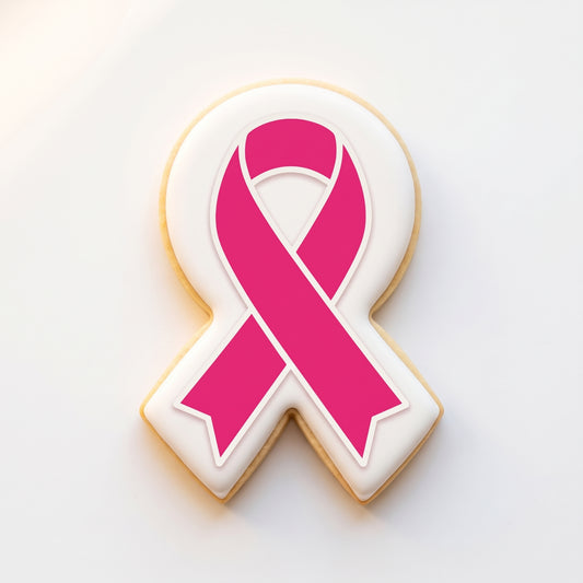 A ribbon-shaped sugar cookie with a solid white icing base and a bold hot pink awareness ribbon printed on top with a clean white border frame.